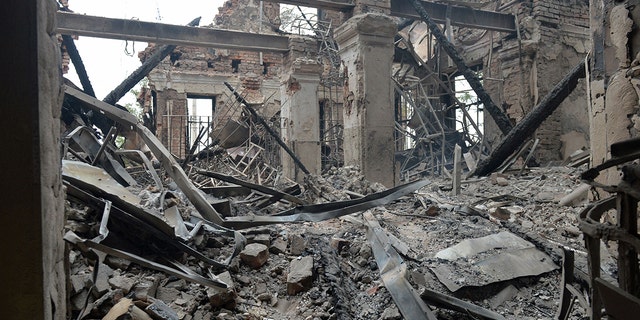 TOPSHOT - This photograph shows a view of a school destroyed as a result of fighting not far from the center of the Ukrainian city of Kharkiv, located about 50 km from the Ukrainian-Russian border, on February 28, 2022. - (Photo by Sergey BOBOK / AFP) (Photo by SERGEY BOBOK / AFP via Getty Images)