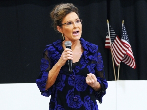 former Alaska governor Sarah Palin speaking into a microphone